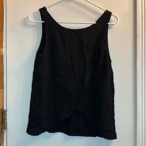 Black sleeveless blouse with a semi-open back
